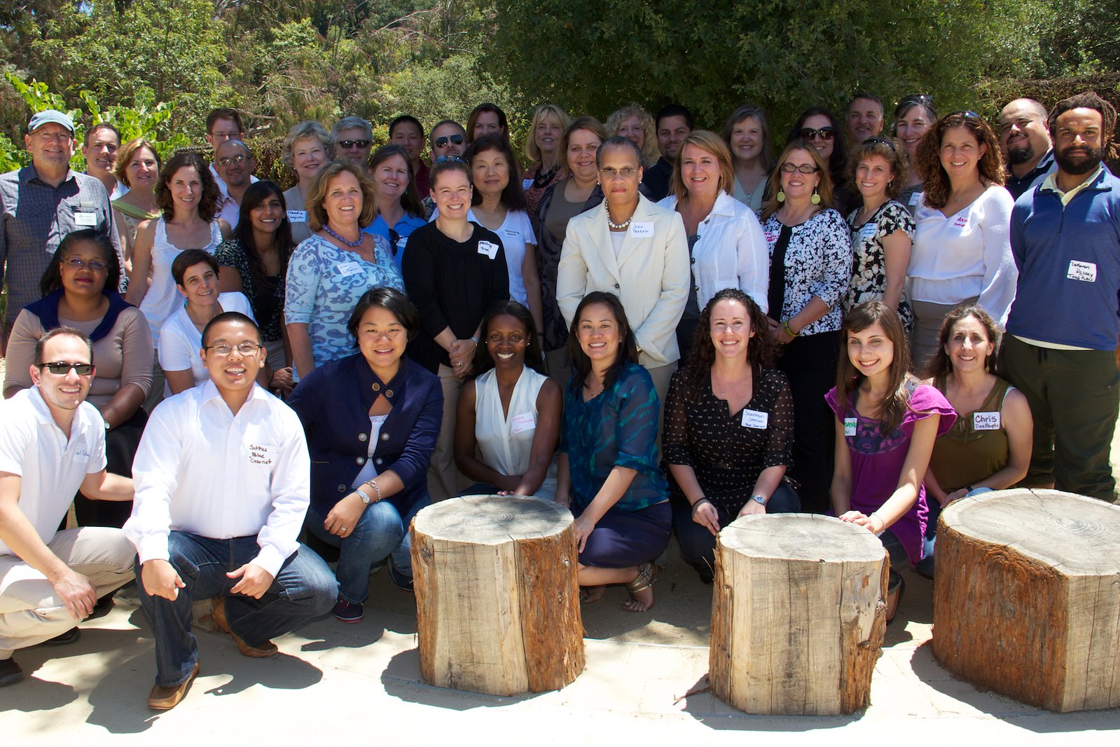 A large group photo of guests at Blue Garnet's 10th Anniversary strategy lab